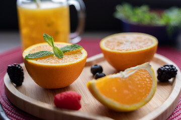 Wall Mural - Fresh oranges, apple and blackberry