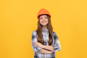 crossed hands. happy child worker wear hardhat. childhood development. happy labour day.