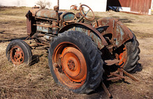 Umea, Norrland Sweden - March 20, 2021: Rusty Tractor That No Longer Works, Displayed As Exhibit