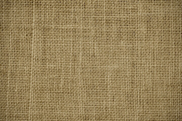 Wall Mural - Hessian sackcloth burlap woven texture background, Cotton woven fabric close up with flecks of varying colors of beige and brown, with copy space for text decoration.