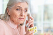 © aletia2011 - Sick senior woman calling to doctor