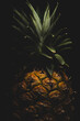 Macro close up portrait of a Pineapple, black background