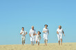 © aletia2011 - Happy family together on sand beach