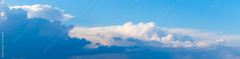 Panorama of blue sky with dark and light clouds - obrazy, fototapety, plakaty 