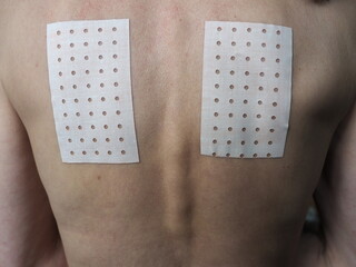 medicated pain relief patch. close up of patch for back pain relief