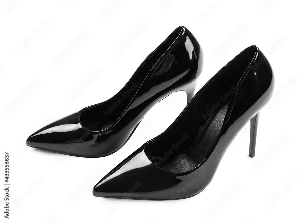 Pair of stylish high heels on white background