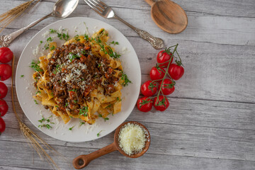 Wall Mural - Vegetarian lentil bolognese sauce with pasta on a plate