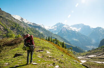 a lone hiker on the beas kund trek in northern india