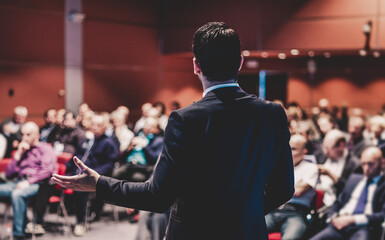 Wall Mural - speaker giving a talk at business conference meeting.