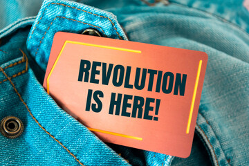 Text sign showing Revolution is Here 