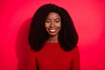 Wall Mural - Portrait of attractive cheerful brunet girl wearing pullover isolated over vivid red color background