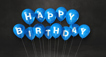 Blue Happy Birthday Air Balloons On A Black Background Scene. Horizontal Banner