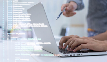 close up student programmer hand typing on keyboard on laptop to input code language into software for study bug and defect of system during suggest by specialist at office for educational technology 