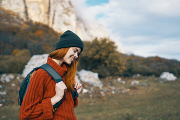 cheerful woman hiker backpack walk vacation freedom mountains