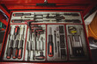 © Wavebreak Media - Close up of case filled with tools and srew driver set used in rapair workshop