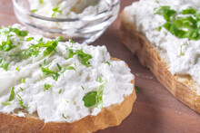Cottage Cheese Sprinkled With Herbs On A Slice Of Bread