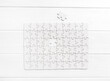 © Ievgen Skrypko - Top view of white jigsaw puzzle