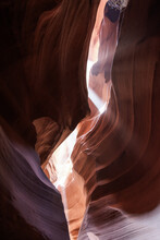 Picturesque Landscape Of Narrow And Deep Slot Canyon Illuminated By Daylight Placed In Antelope Canyon In America
