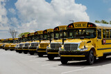 Fototapeta  - Yellow school bus for children educational transport on the street