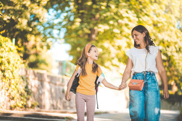 Wall Mural - Kid talking and walking with mom.