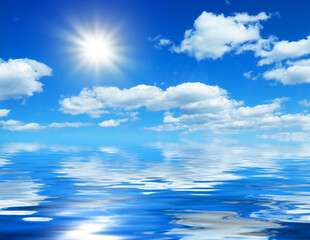 Wall Mural - natural ocean sunny background, blue sky with white cumulus clouds and shining sun reflected in calm