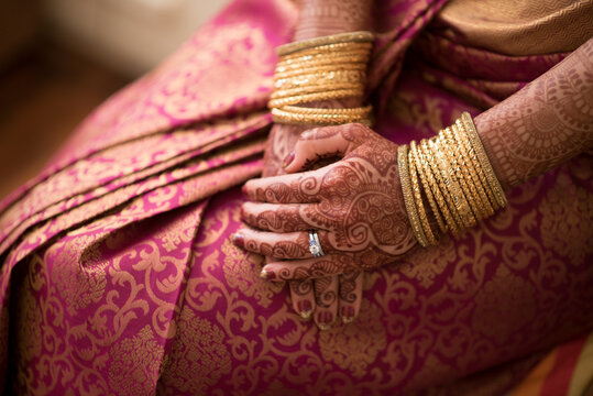 Henna tattoos on married woman hands
