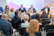 © Anton Gvozdikov - Speakers discussing business problems in auditorium