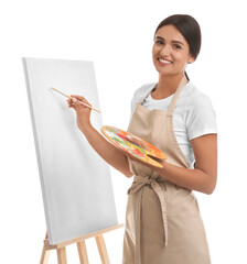 Canvas Print - Young woman drawing on easel against white background