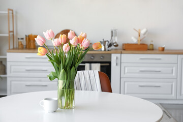 Sticker - Bouquet of beautiful tulip flowers on table in kitchen