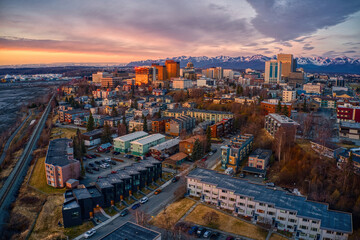 aerial view of a sunset over downtown anchorage, alaska in spring