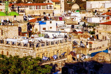 Wall Mural - Roofs of houses and temples of the old city of Jerusalem, ISARIL on a sunny day