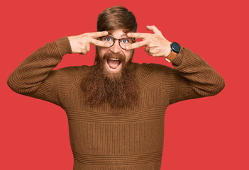 Poster - Young irish redhead man wearing casual clothes and glasses doing peace symbol with fingers over face, smiling cheerful showing victory