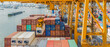 Leinwandbild Motiv crane loading container box to container cargo freight ship in port shipping containers a logistics business and global trading. logistics, global business and transportation concept