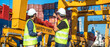 © tuastockphoto - worker working with radio transceiver for controlling crane to loading container box to container ship in port shipping containers. logistics, sea transportation and logistics business concept