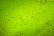 © FranciscoJavier - bright green liquid background of bubbles with movement