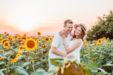 Sticker - cute couple at sunflowers field on sunset