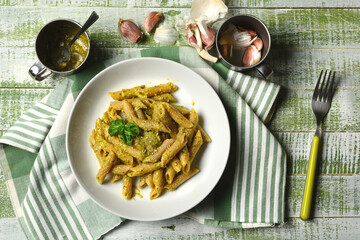 Wall Mural - pasta with pesto - traditional Italian recipe - closeup