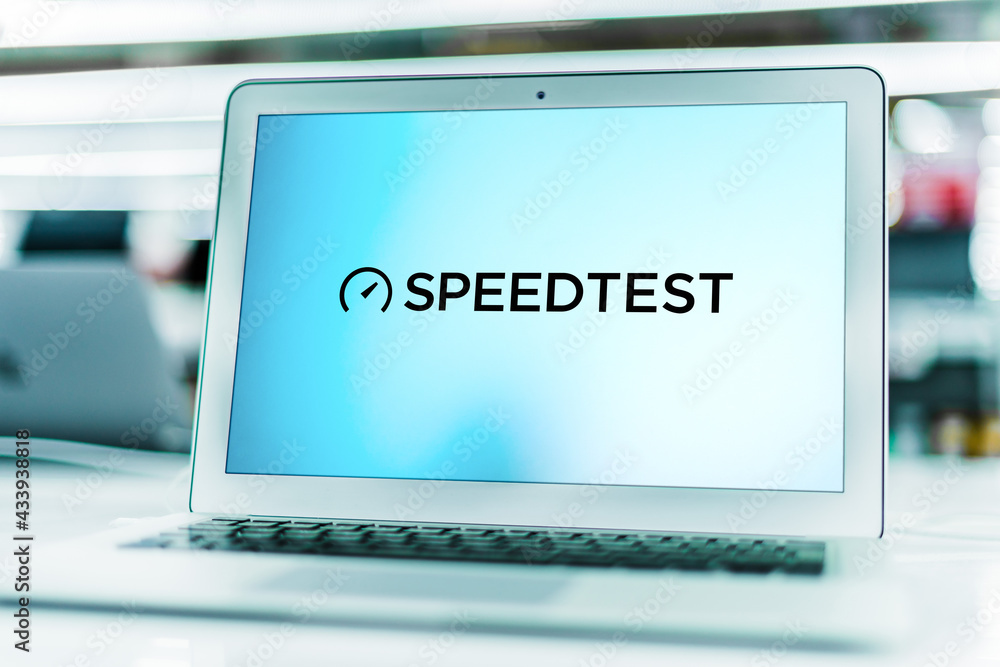 Laptop computer displaying logo of Speedtest Stock Photo | Adobe Stock