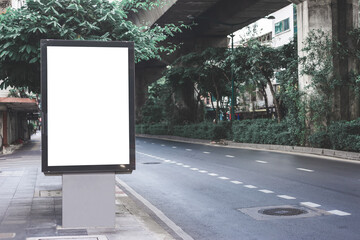 Wall Mural - big blank billboard white led screen vertical outstanding in the city side the road traffic for disp