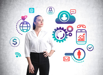 businesswoman standing hand on waist and network data icons