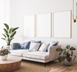 Poster mockup in bright modern room, white sofa with blue cushions and green plants on minimal background, 3d render
