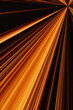 Abstract black background with a splash of bright orange light lines on it