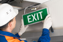 Foreman Completes Installation Of Lighting Signs Emergency Exit