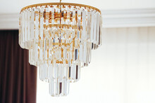 Crystal Glass Chandelier With Golden Details, Luxury Furniture And Home Decor Concept