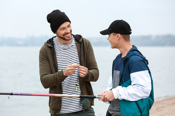 Poster - Father and son fishing together on river