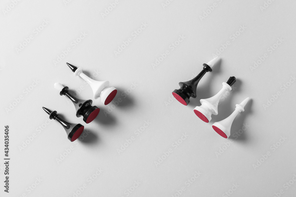 Chess pieces on light background