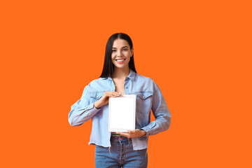 Poster - Young woman with tablet computer on color background