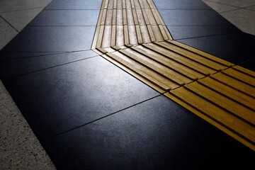 Subway station floor with pattern for blind people to follow