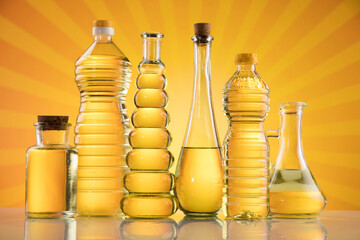 Wall Mural - Olive oil bottles, olive branch and Cooking oils