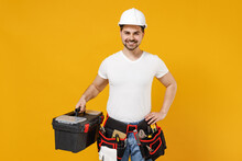 Young Smiling Excited Confident Employee Handyman Man 20s In Protective Helmet Hardhat Tool Case Box Isolated On Yellow Background Instruments Accessory Renovation Apartment Room Repair Home Concept
